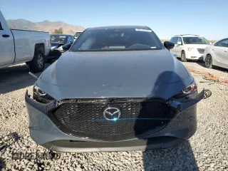 2024 Mazda 3 S Carbon Edition with VIN JM1BPBLM4R1714705, listed as a Copart auction lot 69140474 with 1,808 mi miles and Salvage Title. Bid and sale history available at DreamBid. Image 5.