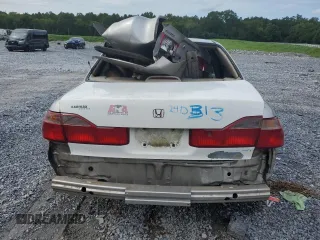 1998 Honda Accord LX with VIN 1HGCG5548WA156745, listed as a Copart auction lot 61944775 with 357,402 mi miles and Salvage title. Bid and sale history available at DreamBid. Image 6.
