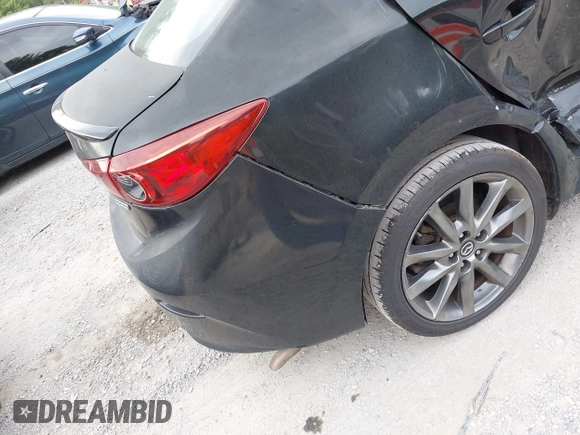 2018 Mazda 3 Touring z VIN 3MZBN1V36JM202498, wystawiony jako IAAI lot #42380709 z przebiegiem 108 930 mil mil oraz . Historia ofert i sprzedaży dostępna na DreamBid. Obrazek 19.