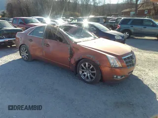 2008 Cadillac CTS AWD w/1SB with VIN 1G6DT57V980188992, listed as a IAAI auction lot 40945087 with 63,744 mi miles. Bid and sale history available at carsss.com. Image 1.