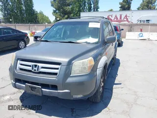 2007 Honda Pilot EX-L with VIN 5FNYF18587B015655, listed as a IAAI auction lot 42485193 with 293,684 mi miles and . Bid and sale history available at DreamBid. Image 6.