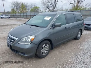 2007 Honda Odyssey EX-L with VIN 5FNRL38627B413638, listed as a IAAI auction lot 41960963 with 172,968 mi miles and . Bid and sale history available at DreamBid. Image 2.