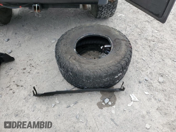 2000 Jeep Wrangler Sport with VIN 1J4FA49S9YP743515, listed as a Copart auction lot 53906305 with 247,349 mi miles and Salvage title. Bid and sale history available at DreamBid. Image 13.