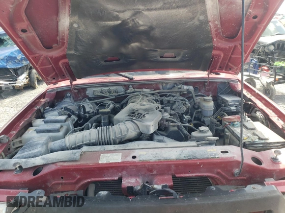 2010 Ford Ranger XLT z VIN 1FTKR4EE3APA70305, wystawiony jako Copart lot #61850725 z przebiegiem 174 677 mil mil oraz Szkoda całkowita • Salvage title. Historia ofert i sprzedaży dostępna na DreamBid. Obrazek 11.