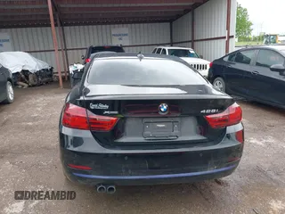 2015 BMW 4 Series 428i xDrive with VIN WBA3N5C56FK198340, listed as a IAAI auction lot 42153190 with 96,054 mi miles and . Bid and sale history available at DreamBid. Image 16.
