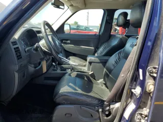 2012 Jeep Liberty Sport with VIN 1C4PJMAK5CW182377, listed as a Copart auction lot 57671345 with 140,236 mi miles and Salvage title. Bid and sale history available at DreamBid. Image 7.