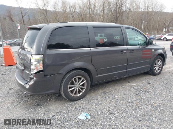 2014 Dodge Grand Caravan SXT with VIN 2C4RDGCG6ER376714, listed as a IAAI auction lot 41828025 with 172,285 mi miles and . Bid and sale history available at DreamBid. Image 4.