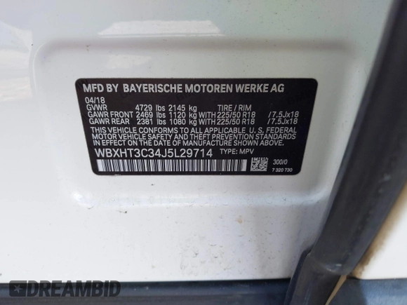 2018 BMW X1 xDrive28i with VIN WBXHT3C34J5L29714, listed as a IAAI auction lot 41825126 with 89,970 mi miles. Bid and sale history available at carsss.com. Image 9.