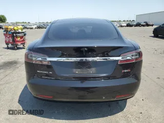2016 Tesla Model S 90D z VIN 5YJSA1E29GF158774, wystawiony jako Copart lot #60143405 z przebiegiem Nie podano mil oraz Szkoda całkowita • Salvage title. Historia ofert i sprzedaży dostępna na DreamBid. Obrazek 6.