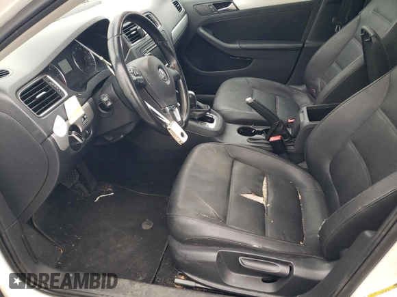 2012 Volkswagen Jetta TDI w/Premium with VIN 3VWLL7AJXCM417595, listed as a Copart auction lot 47739455 with 153,437 mi miles and Clean title. Bid and sale history available at DreamBid. Image 7.
