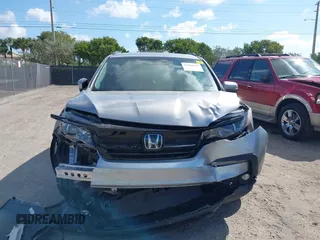 2022 Honda Pilot Special Edition with VIN 5FNYF5H24NB029479, listed as a IAAI auction lot 41504673 with Not Provided miles and . Bid and sale history available at carsss.com. Image 6.