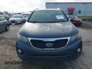 2012 Kia Sorento LX with VIN 5XYKT4A68CG197508, listed as a IAAI auction lot 42082566 with 195,862 mi miles. Bid and sale history available at carsss.com. Image 6.