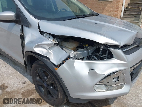 2014 Ford Escape SE with VIN 1FMCU9GX9EUD83148, listed as a IAAI auction lot 42449815 with 120,062 mi miles and . Bid and sale history available at DreamBid. Image 6.