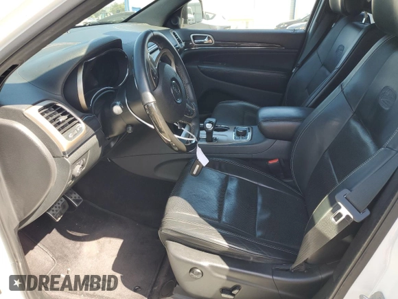 2015 Jeep Grand Cherokee High Altitude с VIN 1C4RJFCM2FC215232, выставлен на аукционе Copart как лот 60002875 с пробегом 122 813 миль миль и Списание • Salvage title. История ставок и продаж доступна на DreamBid. Изображение 7.