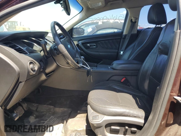 2012 Ford Taurus Limited z VIN 1FAHP2FW4CG112923, wystawiony jako Copart lot #56169085 z przebiegiem 142 687 mil mil oraz Szkoda całkowita • Salvage title. Historia ofert i sprzedaży dostępna na DreamBid. Obrazek 7.