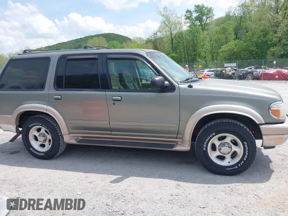 2000 Ford Explorer Eddie Bauer z VIN 1FMDU74E2YUA00568, wystawiony jako IAAI lot #42176409 z przebiegiem 150 479 mil mil oraz . Historia ofert i sprzedaży dostępna na DreamBid. Obrazek 13.