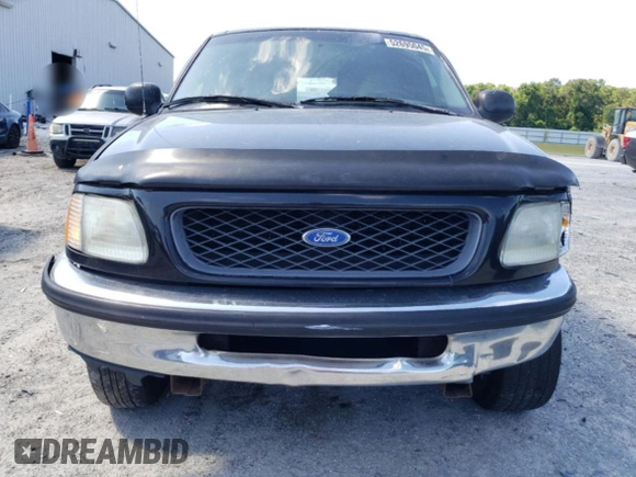 1997 Ford F-150 XL z VIN 1FTEX17L8VNB84878, wystawiony jako Copart lot #52695045 z przebiegiem 446 498 mil mil oraz Szkoda całkowita • Salvage title. Historia ofert i sprzedaży dostępna na DreamBid. Obrazek 5.