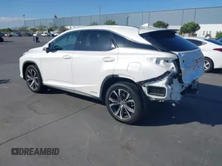 2021 Lexus RX 450h with VIN 2T2HGMDA2MC071281, listed as a IAAI auction lot 42587770 with 88,009 mi miles and . Bid and sale history available at DreamBid. Image 3.