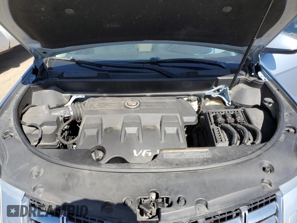 2013 Cadillac SRX Premium Collection with VIN 3GYFNJE31DS555908, listed as a Copart auction lot 58870495 with 170,880 mi miles and Clean title. Bid and sale history available at DreamBid. Image 12.