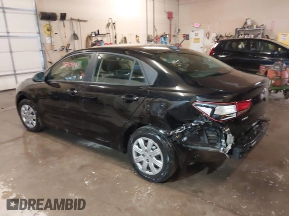 2021 Kia Rio LX with VIN 3KPA24AD9ME385515, listed as a IAAI auction lot 38404411 with 79,615 mi miles. Bid and sale history available at carsss.com. Image 3.