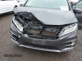 2019 Honda Odyssey Elite with VIN 5FNRL6H91KB048535, listed as a IAAI auction lot 40906579 with 37,322 mi miles and . Bid and sale history available at DreamBid. Image 6.