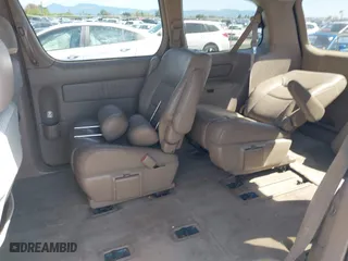 1998 Toyota Sienna LE with VIN 4T3ZF13CXWU023663, listed as a IAAI auction lot 42011727 with 214,972 mi miles. Bid and sale history available at carsss.com. Image 8.
