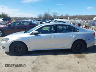 2015 Volkswagen Passat 1.8T Limited Edition with VIN 1VWAT7A32FC043594, listed as a IAAI auction lot 41867799 with 195,144 mi miles. Bid and sale history available at carsss.com. Image 14.