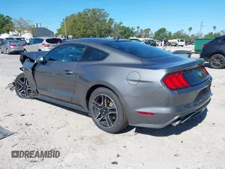 2023 Ford Mustang EcoBoost with VIN 1FA6P8TH4P5100952, listed as a IAAI auction lot 41860121 with 36,075 mi miles. Bid and sale history available at carsss.com. Image 3.