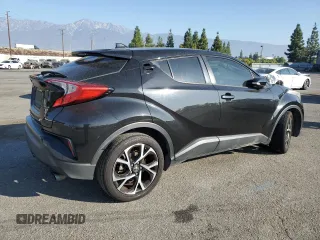 2018 Toyota C-HR XLE with VIN NMTKHMBX7JR022593, listed as a Copart auction lot 70659634 with 106,692 mi miles and Salvage Title. Bid and sale history available at carsss.com. Image 3.