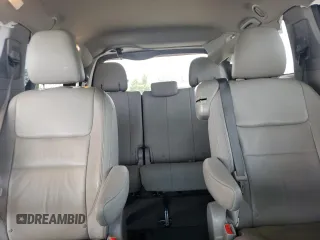 2015 Toyota Sienna XLE с VIN 5TDYK3DC0FS630013, выставлен на аукционе Copart как лот 60044955 с пробегом 124 063 миль миль и Списание • Salvage title. История ставок и продаж доступна на DreamBid. Изображение 10.