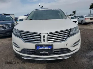 2015 Lincoln MKC z VIN 5LMCJ1A94FUJ19967, wystawiony jako Copart lot #58873665 z przebiegiem Nie podano mil oraz Szkody całkowita. Historia ofert i sprzedaży dostępna na DreamBid. Obrazek 5.