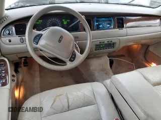 2001 Lincoln Town Car Executive z VIN 1LNHM81W91Y729914, wystawiony jako Copart lot #41593085 z przebiegiem 144 950 mil mil oraz Czysty tytuł • Clean title. Historia ofert i sprzedaży dostępna na DreamBid. Obrazek 8.
