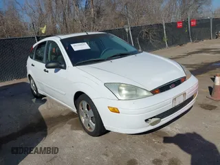 2002 Ford Focus ZX5 z VIN 3FAFP37312R142454, wystawiony jako IAAI lot #41759822 z przebiegiem 215 703 mil mil oraz . Historia ofert i sprzedaży dostępna na DreamBid. Obrazek 1.