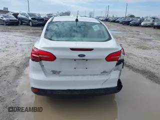 2016 Ford Focus SE z VIN 1FADP3F23GL343651, wystawiony jako IAAI lot #41668112 z przebiegiem 120 891 mil mil oraz . Historia ofert i sprzedaży dostępna na DreamBid. Obrazek 17.