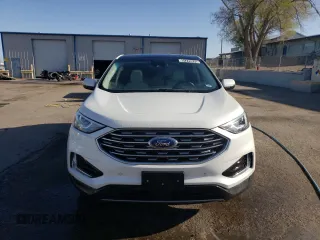 2021 Ford Edge Titanium with VIN 2FMPK4K91MBA27073, listed as a Copart auction lot 51776575 with 113,559 mi miles and Clean title. Bid and sale history available at DreamBid. Image 5.