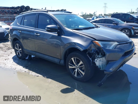 2018 Toyota RAV4 XLE with VIN 2T3WFREV9JW503136, listed as a IAAI auction lot 41815266 with 118,585 mi miles. Bid and sale history available at carsss.com. Image 1.