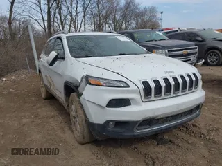 2015 Jeep Cherokee Limited with VIN 1C4PJMDB7FW584076, listed as a IAAI auction lot 41712661 with 183,000 mi miles. Bid and sale history available at carsss.com. Image 1.