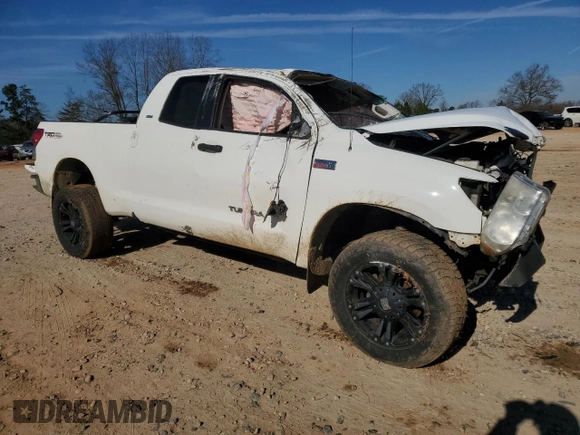 2009 Toyota Tundra 4WD Truck with VIN 5TFBW54179X092767, listed as a Copart auction lot 86620204 with 0 mi miles and Salvage Title. Bid and sale history available at carsss.com. Image 4.
