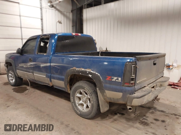2003 Chevrolet Silverado 1500 with VIN 2GCEK19T531275181, listed as a IAAI auction lot 41714036 with 320,291 mi miles. Bid and sale history available at carsss.com. Image 3.