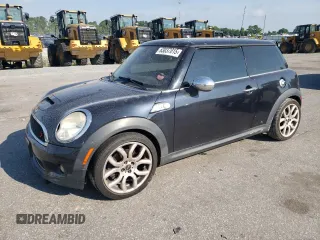 2009 MINI Hardtop S z VIN WMWMF73539TT94991, wystawiony jako Copart lot #63037015 z przebiegiem 101 504 mil mil oraz Szkoda całkowita • Salvage title. Historia ofert i sprzedaży dostępna na DreamBid. Obrazek 1.