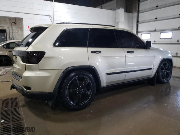 2011 Jeep Grand Cherokee Overland with VIN 1J4RR6GT1BC665906, listed as a Copart auction lot 49647095 with 141,546 mi miles and Clean Title. Bid and sale history available at carsss.com. Image 3.