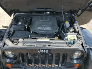 2012 Jeep Wrangler Unlimited Sahara z VIN 1C4HJWEG6CL141988, wystawiony jako Copart lot #61631115 z przebiegiem 140 401 mil mil oraz Szkoda całkowita • Salvage title. Historia ofert i sprzedaży dostępna na DreamBid. Obrazek 11.