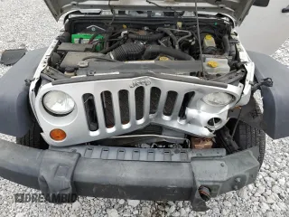 2007 Jeep Wrangler Unlimited X with VIN 1J4GA39117L169245, listed as a Copart auction lot 56731665 with 136,247 mi miles and Salvage title. Bid and sale history available at DreamBid. Image 12.