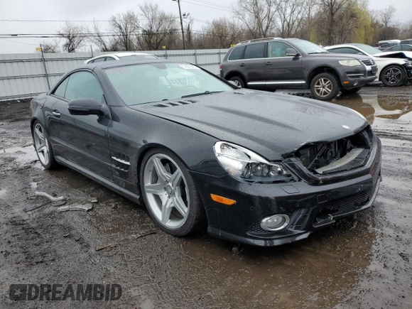 2011 Mercedes-Benz SL 550 with VIN WDBSK7BA8BF165312, listed as a Copart auction lot 51907465 with 32,057 mi miles and Salvage title. Bid and sale history available at DreamBid. Image 4.