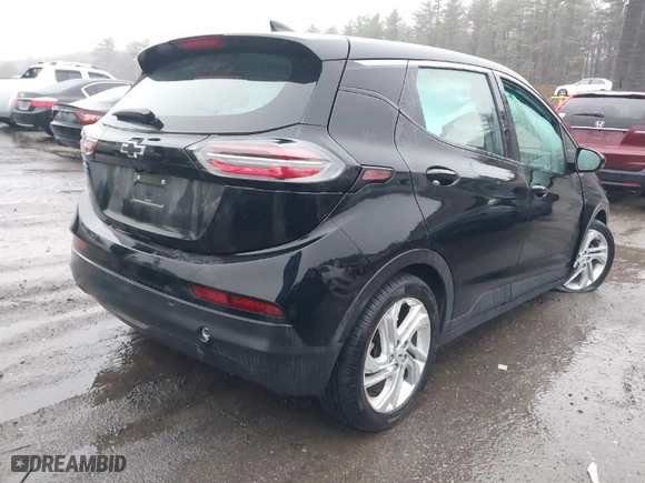 2023 Chevrolet Bolt EV 1LT with VIN 1G1FW6S02P4111699, listed as a IAAI auction lot 41943946 with 57,343 mi miles. Bid and sale history available at carsss.com. Image 4.