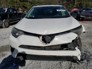 2016 Toyota RAV4 LE with VIN JTMZFREV2GJ077312, listed as a Copart auction lot 88358125 with 126,428 mi miles and Salvage Title. Bid and sale history available at carsss.com. Image 5.