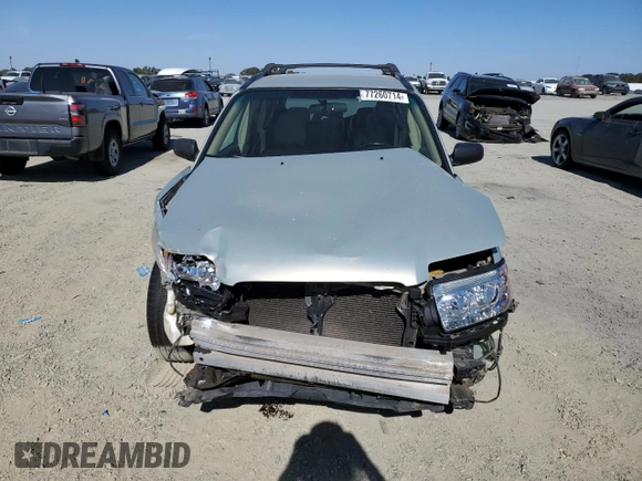 2006 Subaru Forester 2.5 X with VIN JF1SG63686H746381, listed as a Copart auction lot 77260714 with 208,580 mi miles and Salvage Title. Bid and sale history available at carsss.com. Image 5.