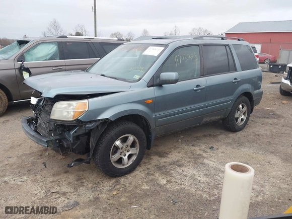 2006 Honda Pilot EX-L with RES with VIN 2HKYF18646H555514, listed as a IAAI auction lot 41703223 with 292,487 mi miles. Bid and sale history available at carsss.com. Image 2.