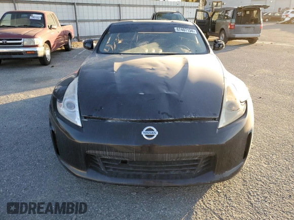2015 Nissan 370Z with VIN JN1AZ4EH8FM444456, listed as a Copart auction lot 67407134 with 58,513 mi miles and Salvage Title. Bid and sale history available at carsss.com. Image 5.