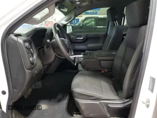 2019 Chevrolet Silverado 1500 Custom with VIN 1GCRYBEH8KZ404690, listed as a Copart auction lot 79660354 with 84,269 mi miles and Salvage Title. Bid and sale history available at DreamBid. Image 7.